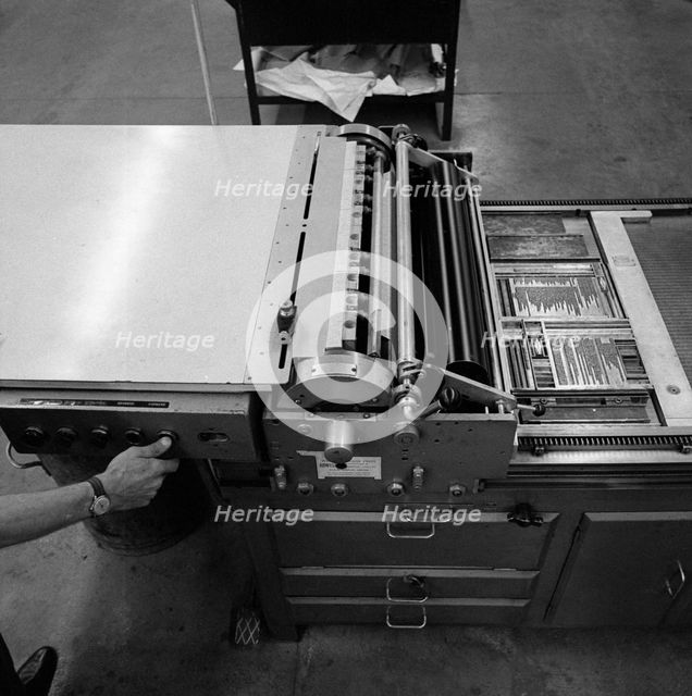 A proofing press with plates at the White Rose Press, Mexborough, South Yorkshire, 1968.  Artist: Michael Walters
