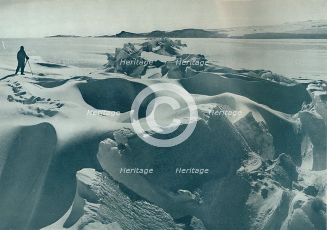 'A Pressure Ridge in the Sea-Ice Running Towards Cape Barne', 1911, (1913). Artist: Herbert Ponting.