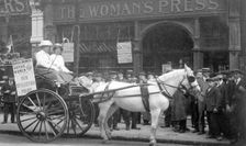 A press cart outside the Woman's Press, Charing Cross Road, London, July 1911. Creator: Unknown