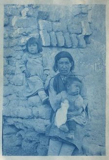 A Pueblo woman with two children (image 1 of 2), c.1890. Creator: Charles Fletcher Lummis
