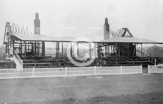 A racecourse stand wrecked by suffragettes in 1913. Creator: Unknown.