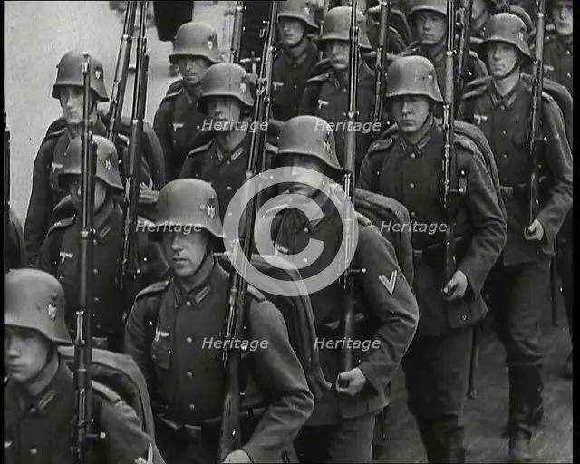 A Regiment of Male German Soldiers Marching Along a German Street, 1939. Creator: British Pathe Ltd.