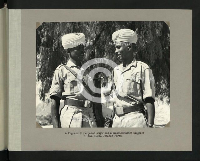 A Regiment Sergeant Major and a Quartermaster Sergeant of the Sudan Defence Force, 1964. Creators: Colonial Office, Unknown.