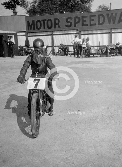A rider at Lea Bridge speedway circuit, Leyton, London, 1928. Artist: Bill Brunell.