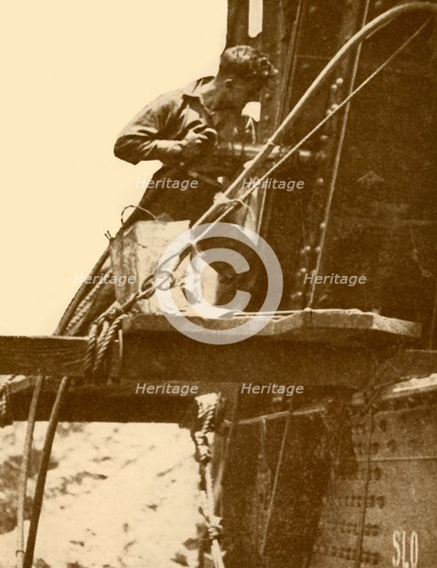'A Riveting Hammer in Operation on the Sydney Harbour Bridge', c1930. Creator: Unknown.