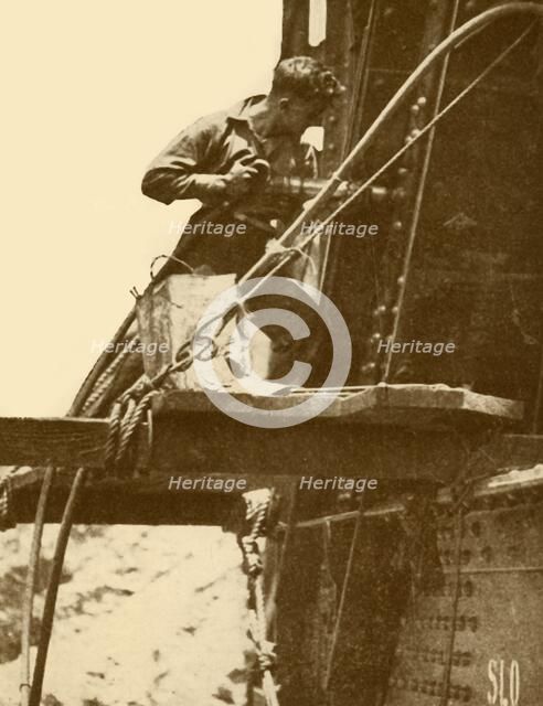 'A Riveting Hammer in Operation on the Sydney Harbour Bridge', c1930. Creator: Unknown.