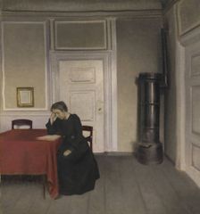 A Room in the Artist's Home in Strandgade, Copenhagen, with the Artist's Wife, 1902. Creator: Vilhelm Hammershøi