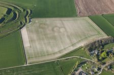 A round barrow cemetery crop mark immediately south east of Maiden Castle, Dorset, 2015. Creator: Historic England