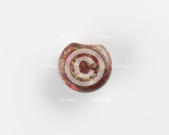 A round marker for games. Chipped, Roman period, (3rd-4th century?). Creator: Unknown.