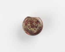 A round marker for games. Chipped, Roman period, (3rd-4th century?). Creator: Unknown