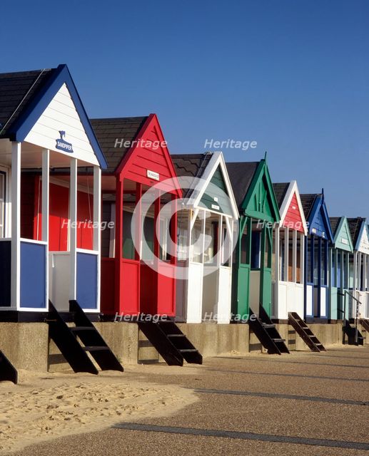 A row of eight colourful beach huts, Southwold, Suffolk, c2000s(?).  Artist: Unknown.