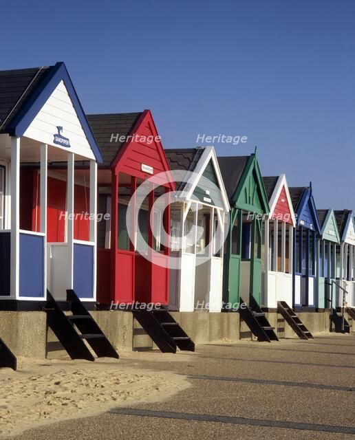 A row of eight colourful beach huts, Southwold, Suffolk, c2000s(?).  Artist: Unknown.