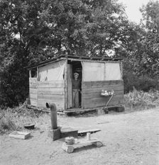A row of shelters...for hop pickers..., near Grants Pass, Josephine County, Oregon, 1939. Creator: Dorothea Lange