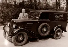 A Rowntree’s sales representative besides his car, York, Yorkshire, 1937