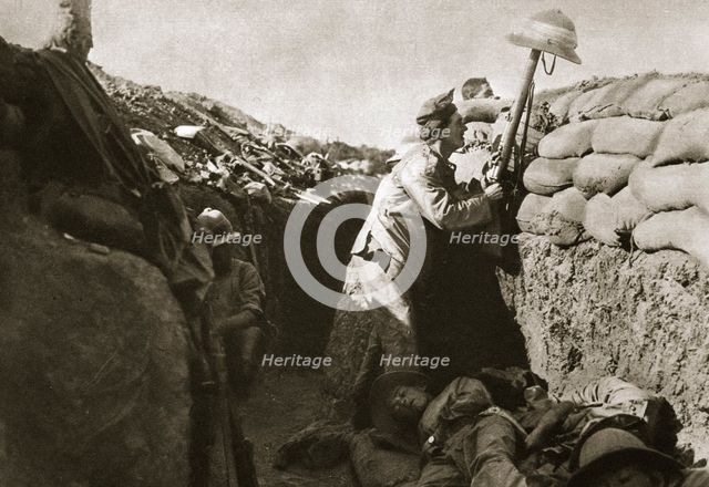 A Royal Irish Fusilier teases a Turkish sniper, Gallipoli, Turkey, World War I, c1915-c1916. Creator: Unknown.