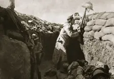A Royal Irish Fusilier teases a Turkish sniper, Gallipoli, Turkey, World War I, c1915-c1916. Creator: Unknown