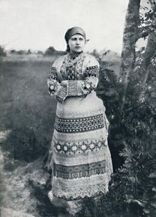 A Russian peasant in costume, 1912