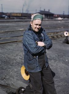 A.S. Gerdee, of 3251 Maypole(?) Street, working as a switchman..., Chicago, Ill., 1943. Creator: Jack Delano