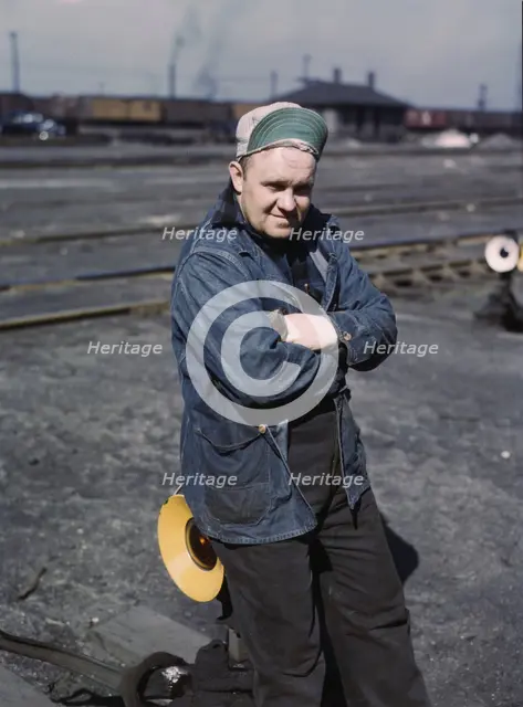 A.S. Gerdee, of 3251 Maypole(?) Street, working as a switchman..., Chicago, Ill., 1943. Creator: Jack Delano.