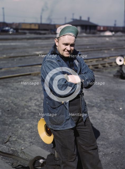 A.S. Gerdee, of 3251 Maypole(?) Street, working as a switchman..., Chicago, Ill., 1943. Creator: Jack Delano.