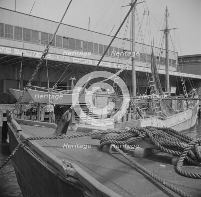 A scene at the Fulton fish market, New York, 1943. Creator: Gordon Parks.