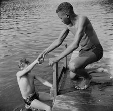 A scene at the swimming dock, Camp Nathan Hale, Southfields, New York, 1943 Creator: Gordon Parks