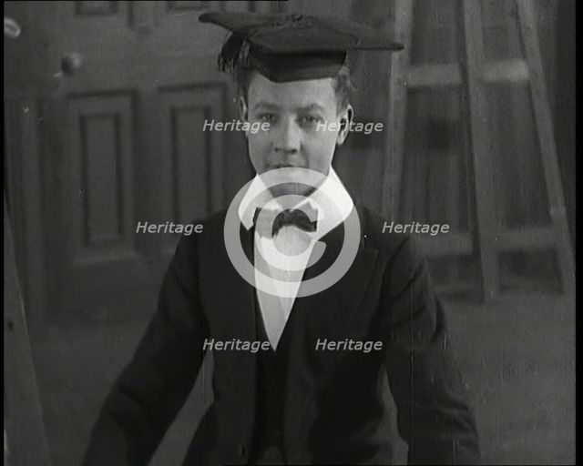 A School Boy in a comedy starring Will Hay, 1920s. Creator: British Pathe Ltd.