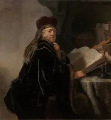 A Scholar Seated at a Desk (Scholar at his Study). Artist: Rembrandt van Rhijn (1606-1669)