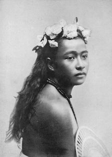 A Samoan girl, with chaplet of hibiscus flowers, 1902. Artist: Thomas Andrew