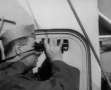 A Sailor Using Binoculars, 1943. Creator: British Pathe Ltd
