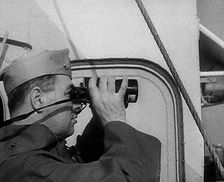 A Sailor Using Binoculars, 1943. Creator: British Pathe Ltd