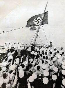 A salute to the Nazi party flag on the SS Bremen, New York, c1935