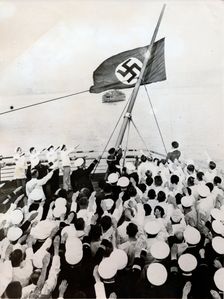 A salute to the Nazi party flag on the SS Bremen, New York, c1935. Creator: Unknown