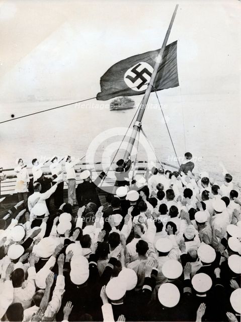 A salute to the Nazi party flag on the SS Bremen, New York, c1935. Creator: Unknown.