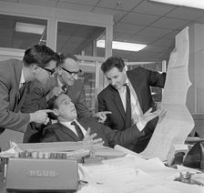A salesman gets a helping hand in checking the figures, 1967. Creator: Michael Walters