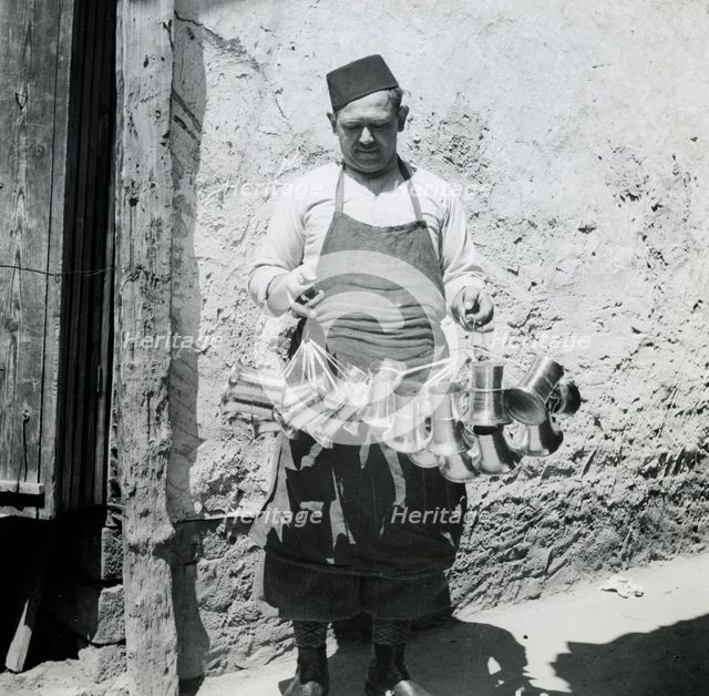 A salesman, Sarajevo, Bosnia and Hercegovina, Yugoslavia, 1939. Creator: Unknown.