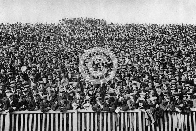 A Saturday winter football crowd, London, 1926-1927. Artist: Unknown
