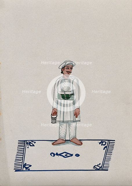 A servant standing on a carpet holding a bunch of keys, (between 1800 and 1899?). Creator: Unknown.