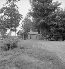 A "shotgun" weatherboard house built in 1925, Person County, North Carolina, 1939. Creator: Dorothea Lange