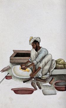 A shoemaker making slippers, (between 1800 and 1899?). Creator: Unknown