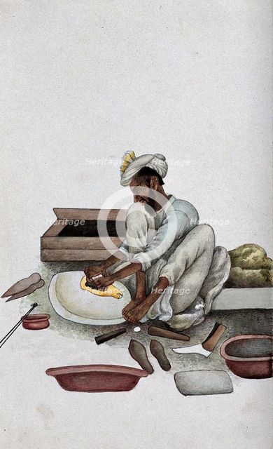 A shoemaker making slippers, (between 1800 and 1899?). Creator: Unknown.