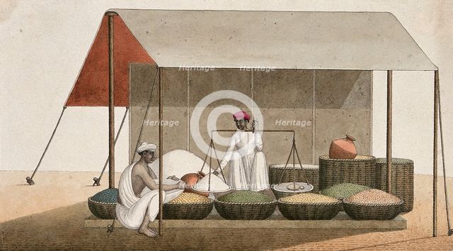 A shopkeeping weighing grains for a customer, (between 1800 and 1899?). Creator: Unknown.