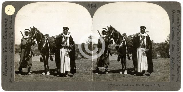 A sheikh and his bodyguard, Syria, 1900s.Artist: Keystone