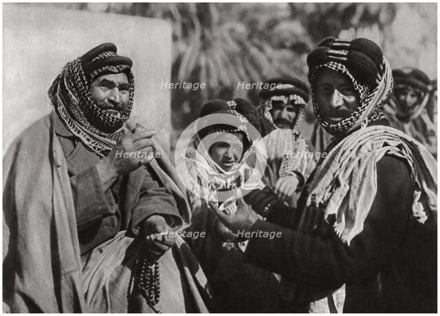 'A sheikh enjoying the famous Arab coffee', Iraq, 1925. Artist: A Kerim