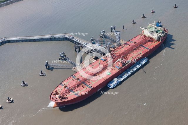 A ship moored up at floating stage on the River Mersey at Tranmere Oil Terminal, Wirral, 2015. Creator: Historic England.