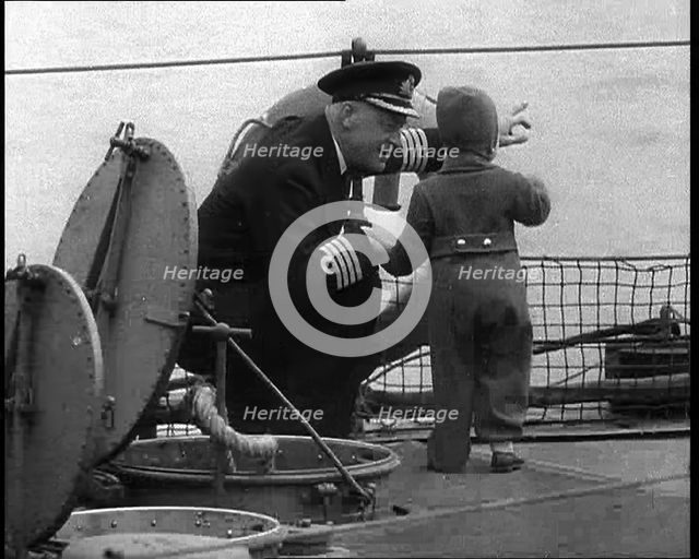 A Ship's Captain Pointing Out To the White Cliffs of Dover To Show the Young Princess..., 1940. Creator: British Pathe Ltd.