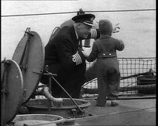 A Ship's Captain Pointing Out To the White Cliffs of Dover To Show the Young Princess..., 1940. Creator: British Pathe Ltd