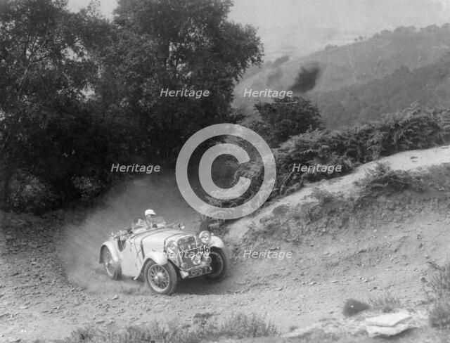 A Singer Nine taking part in the Barnstaple Trial, Barnstaple, Devon, 1935. Artist: Unknown