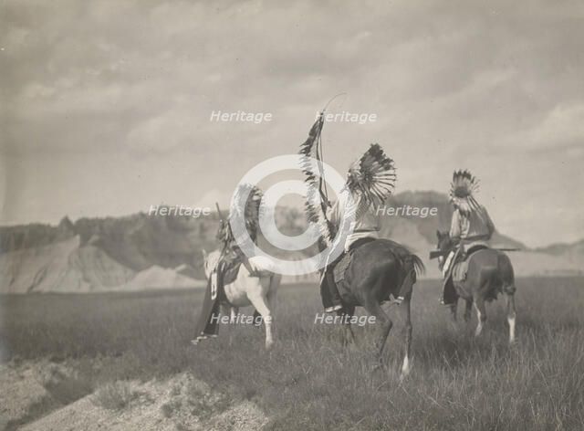 A Sioux war party, 1905. Creator: Edward Sheriff Curtis.