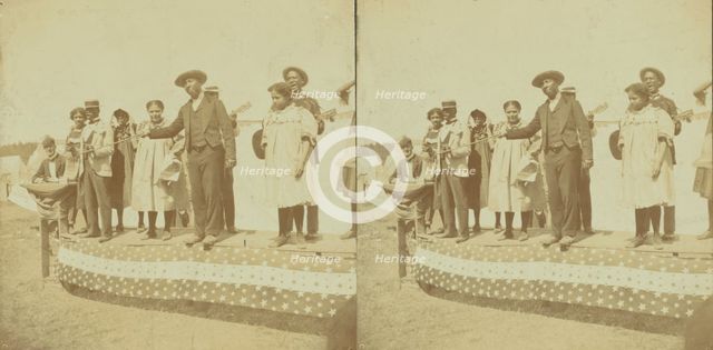 A side show at Chatham Fair, [Musical performers on a small outdoor stage], (1868-1900?). Creator: Unknown.